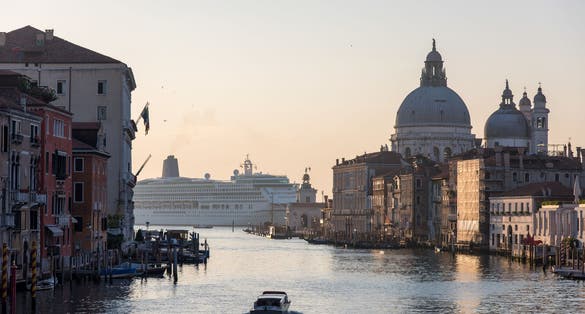 photo of A wide angle shot of the Gallerie dell'Accademia Museum next to the water in Venice, Italy.