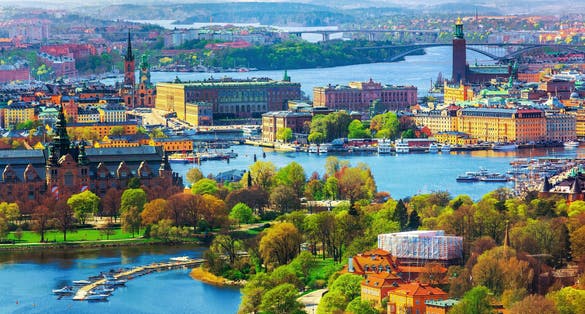 Scenic summer aerial panorama of the Old Town (Gamla Stan) architecture in Stockholm, Sweden.