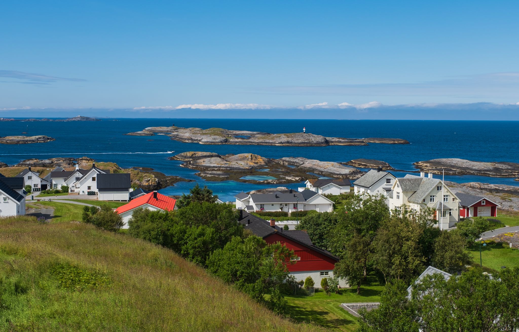 photo of view of picturesque fishing village and harbor of bud, near molde, norway. July 2019