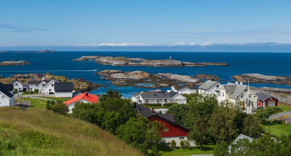 photo of view of picturesque fishing village and harbor of bud, near molde, norway. July 2019