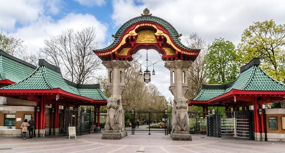Photo of famous entrance at Zoological garden. Zoo is oldest garden (1844, 35 hectares) in Germany with most comprehensive collection of species in world.