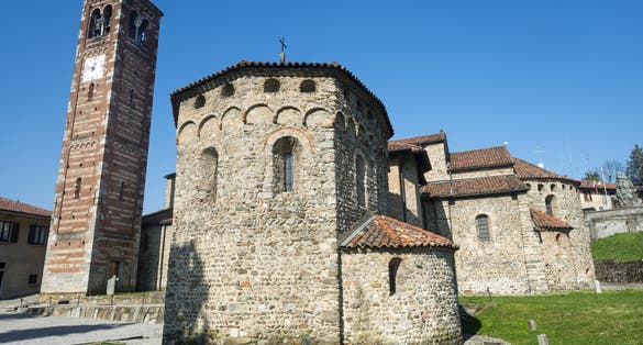 Photo of Agliate Brianza, exterior of the medieval church and baptistery, in Romanesque style, built in the 10th century, Monza, Lombardy, Italy.