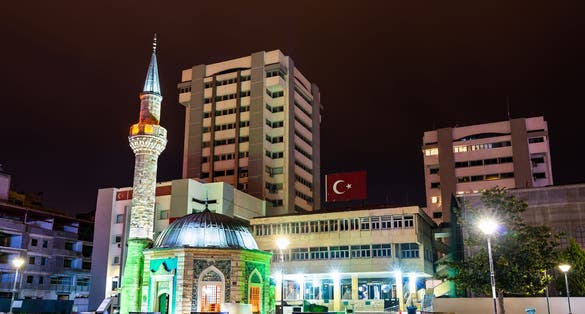 photo of Yali or Konak Mosque on Konak Square at night in Izmir, Turkey.