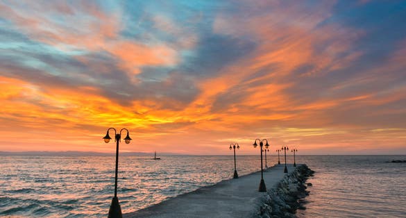 Paralia Katerini beach at sunrise. Greek summer sunrise at the sea. 