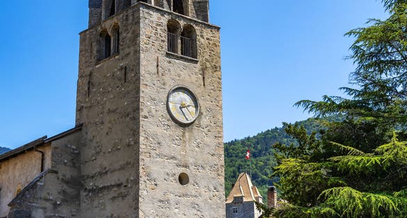 photo of view of Historic reformed church of St. Aurice in city of Aigle, Switzerland.