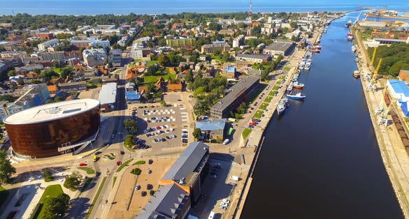 photo of view ofLiepaja, Latvia - Concert hall Great Amber (LIELAIS DZINTARS) is a regional centre of culture, home to the Liepaja Symphony Orchestra, Liepaja Music, Art and Design. City center, trade channel.