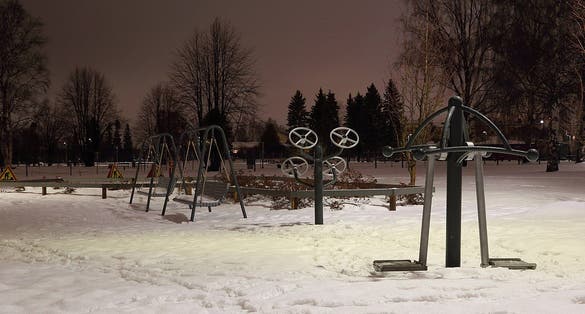 Photo of Hollihaka Park Oulu outdoor gym in winter at night, Finland.