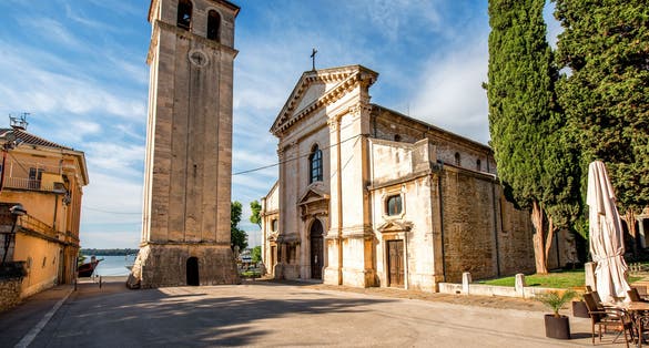 Photo of Cathedral of the Assumption of the Blessed Virgin Mary with clock tower in Pula city in Croatia.