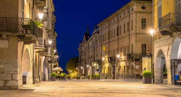 photo of The town of Cuneo in Piedmont at night in Italy.