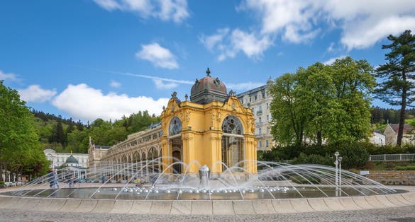 Photo of main colonnade with singing fountain main attraction of Marianske Lazne (Marienbad), Czech Republic.