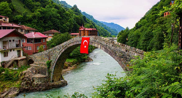 Photo of historical stone bridge over the creek, Rize, Turkey.