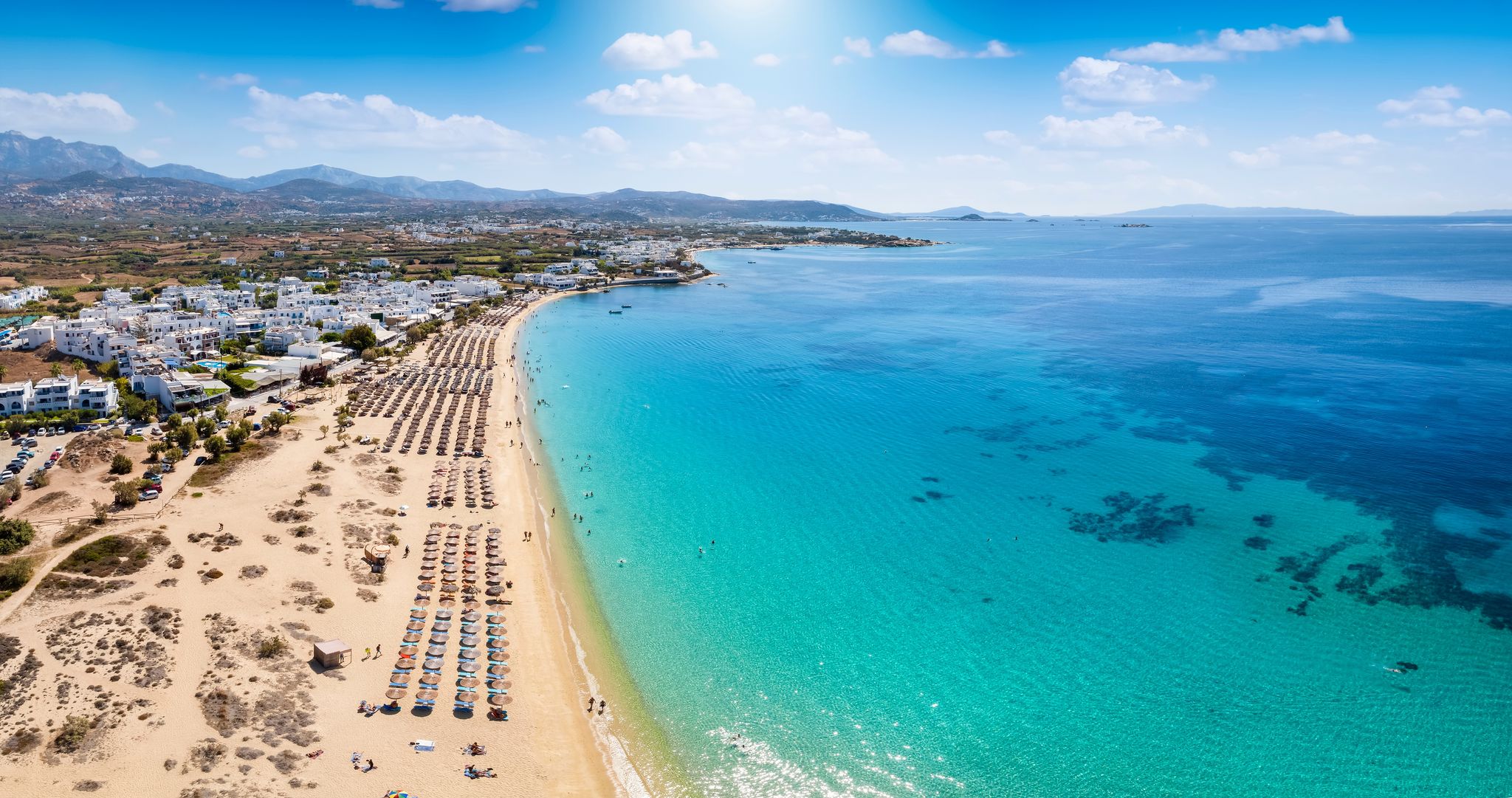 Photo of panoramic aerial view of the popular Agios Prokopios beach at Naxos island, Cyclades, Greece.