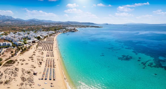 Photo of panoramic aerial view of the popular Agios Prokopios beach at Naxos island, Cyclades, Greece.