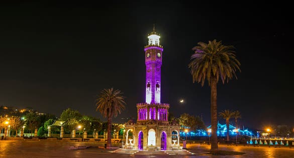 photo of Turkey Izmir Konak Square, Old Clock Tower at night.
