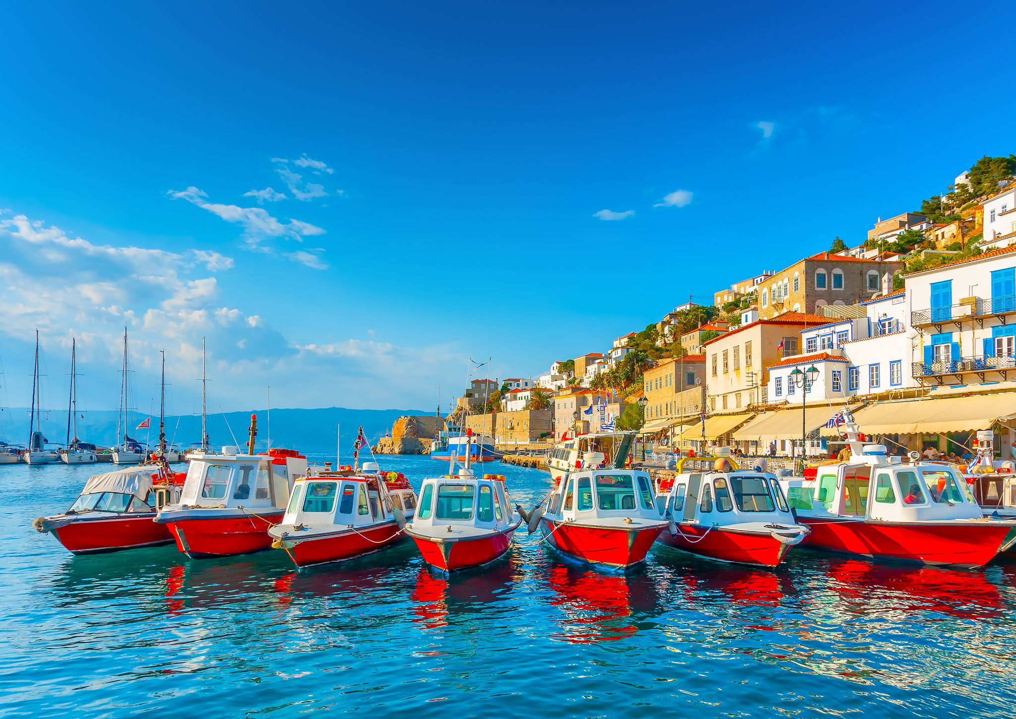 Photo of traditional taxi boats in the port of Hydra island