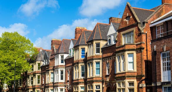 Photo of typical residential brick houses in Cardiff, Wales.