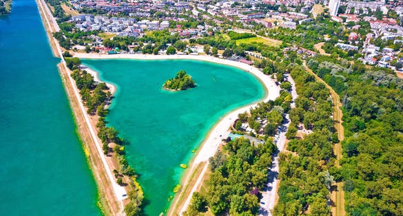 Photo of aerial view of beaches of Jarun lake in city of Zagreb, summer oasis in capital of Croatia.