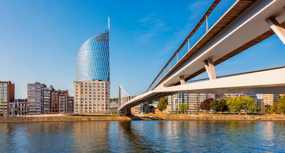Modern bridge crossing Meuse River in Liège Belgium
