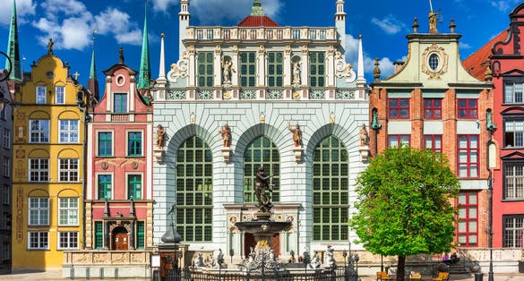 Photo of beautiful architecture of the old town in Gdansk with Artus court, Poland.
