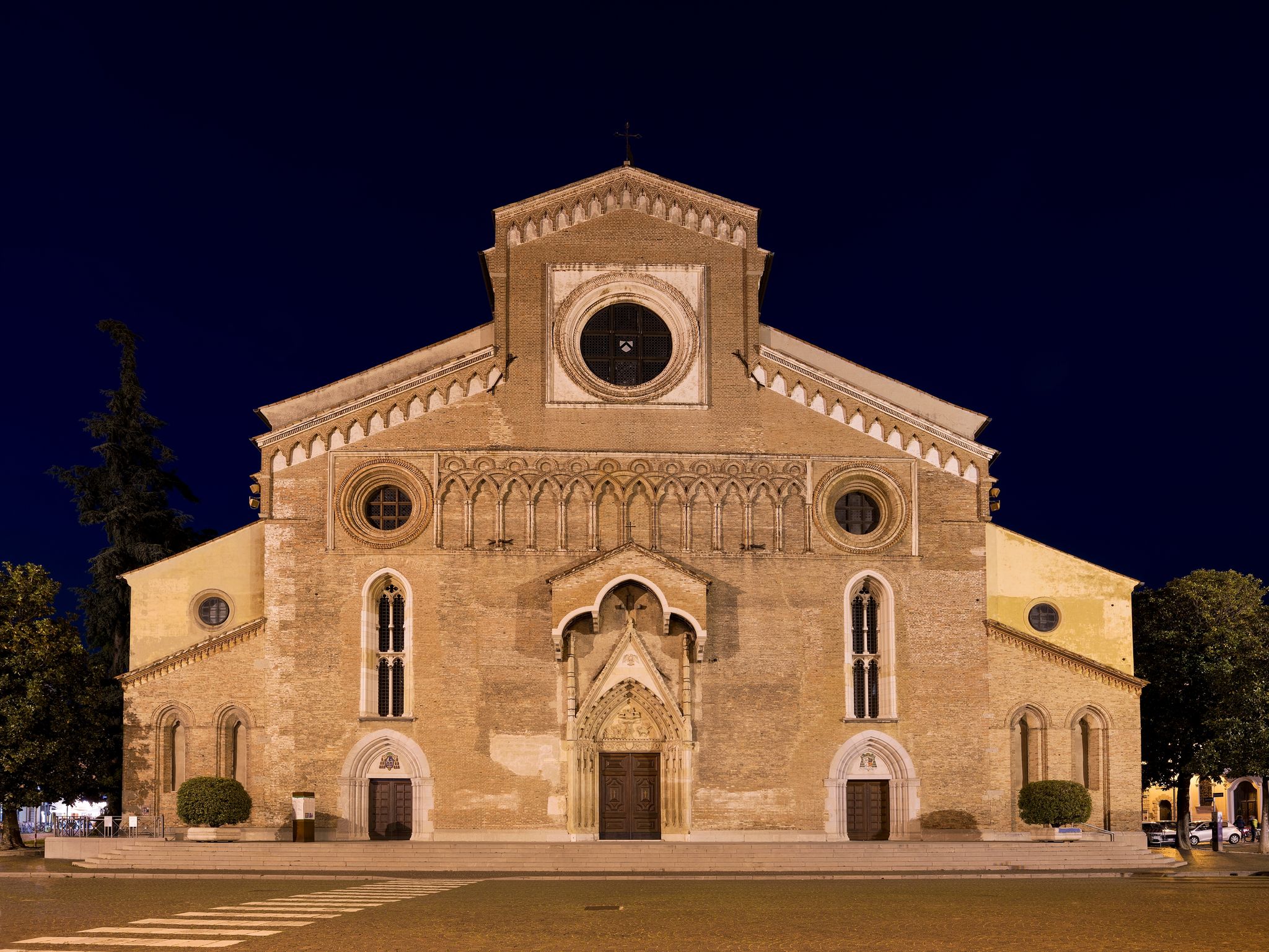 The catholic Cathedral of Santa Maria Annunziata in Udine on the Piazza Duomo in Night Light. The Church was consecrated in 1335.