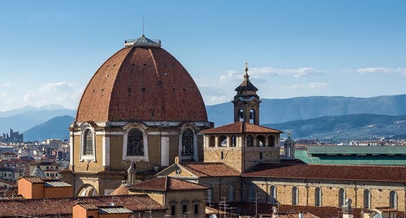 photo of The dome of the Cappella dei Principi dominates the San Lorenzo architectural complex (Medici Chapels). Aerial view from Giotto's Campanile. Florence, Tuscany, Italy.