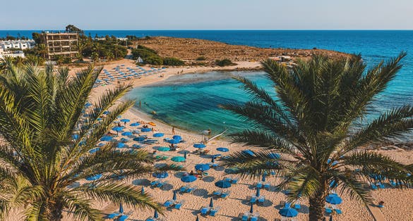 Photo of beautiful Vathia Gonia beach, Ayia Napa, Famagusta, Cyprus. Landmark tourist attraction rocky bay with golden sand.