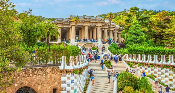 Photo of stairs and buildings in the Park Guell by architect Gaudi o in Barcelona, Spain.