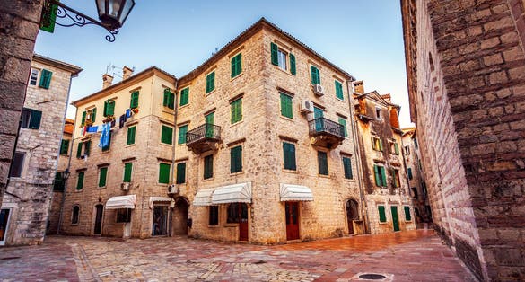 Photo of Attractive view of the cozy street in Kotor old town. Location place Boka Kotorska, Montenegro, Balkan peninsula, Adriatic sea, Europe. Image of tourist attraction. Discover the beauty of earth.