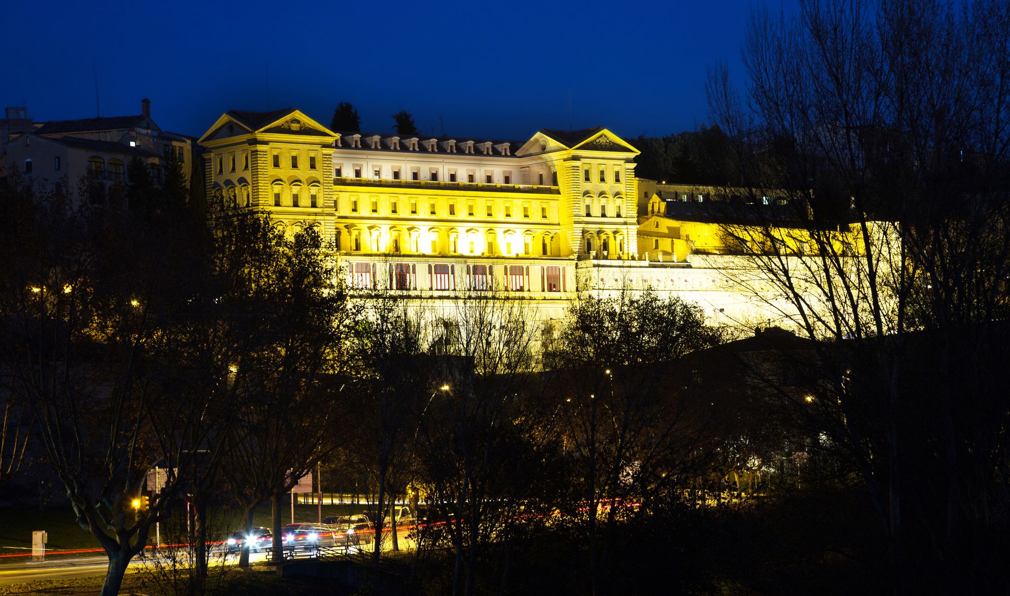 Photo of Church of Saint Ignatius with evening lights in Manresa, Spain.