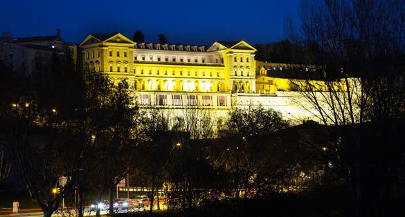Photo of Church of Saint Ignatius with evening lights in Manresa, Spain.
