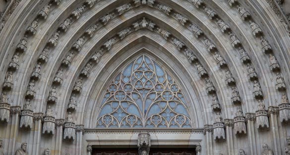 Photo of The main entrance of The Cathedral of the Holy Cross and Saint Eulalia (Catedral de la Santa Creu i Santa Eulàlia).