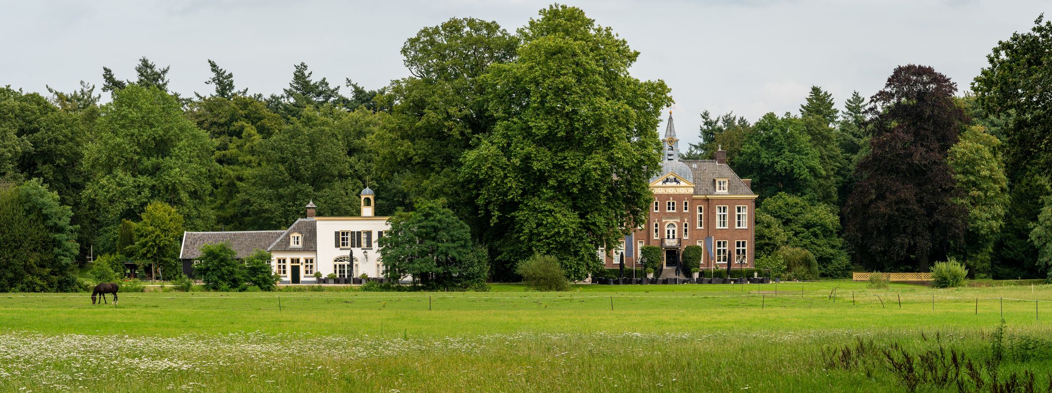photo of panoramic view of Hoekelum castle from 14th century, located between Ede and Bennekom, Province Gelderland, The Netherlands.