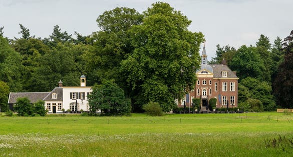 photo of panoramic view of Hoekelum castle from 14th century, located between Ede and Bennekom, Province Gelderland, The Netherlands.