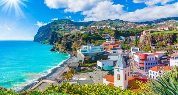 View on the town of Camara de Lobos with church travel on Madeira island in Portugal