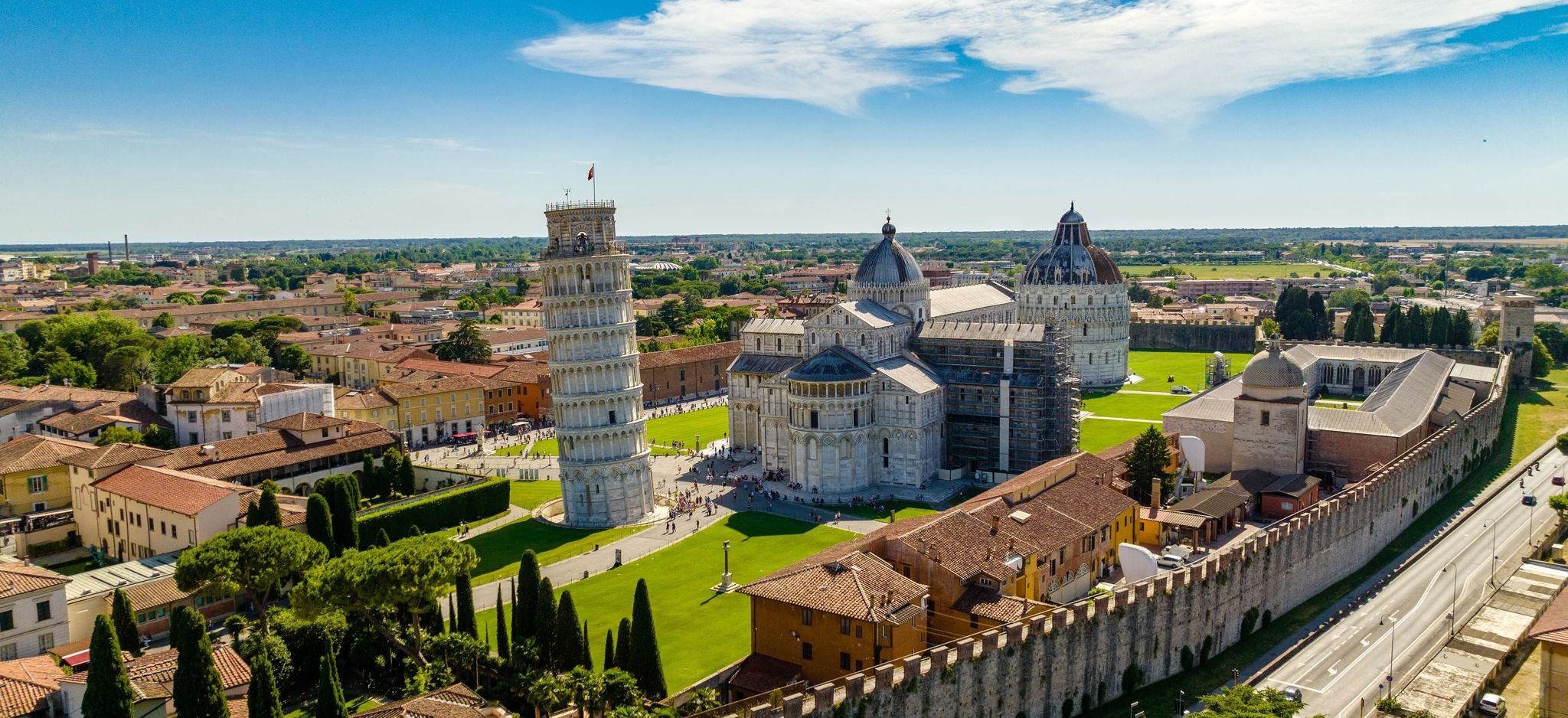 Aerial view of the Leaning Tower of Pisa and cathedral complex on a sunny day in Italy in June..jpg
