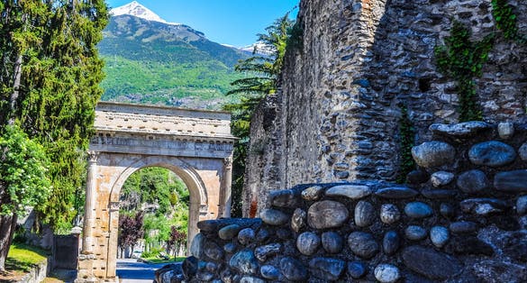 photo of High dynamic range (HDR) Arco di Augusto meaning Emperor Augustus Arch in Susa, Italy .
