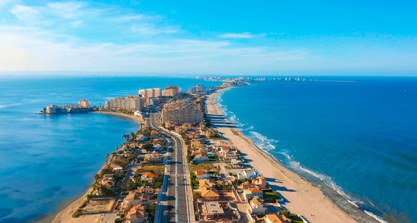 Photo of aerial view. Panoramic view of streets, roads and buildings foreland La Manga del Mar Menor, Cartagena, Murcia, Spain.