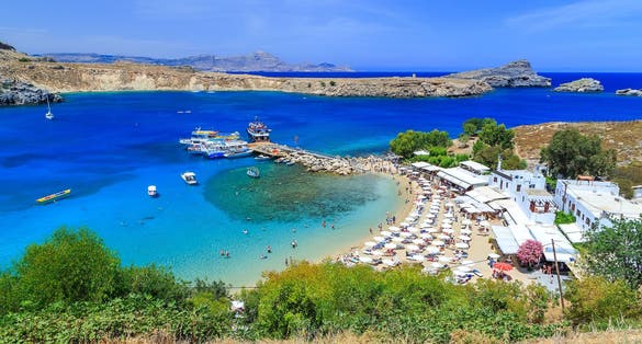 Saint Pauls Bay and Acropolis at Lindos, Rhodes, Greece.