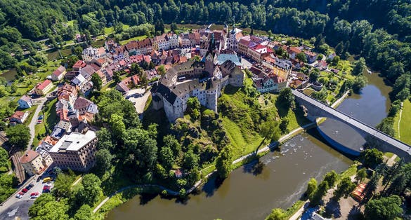 Photo of aerial view of Old Loket town and Loket Castle, Czech Republic.