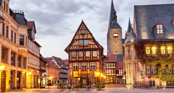 photo of view of Half-timbered house on Market Square of Quedlinburg in the evening, Saxony-Anhalt, Germany