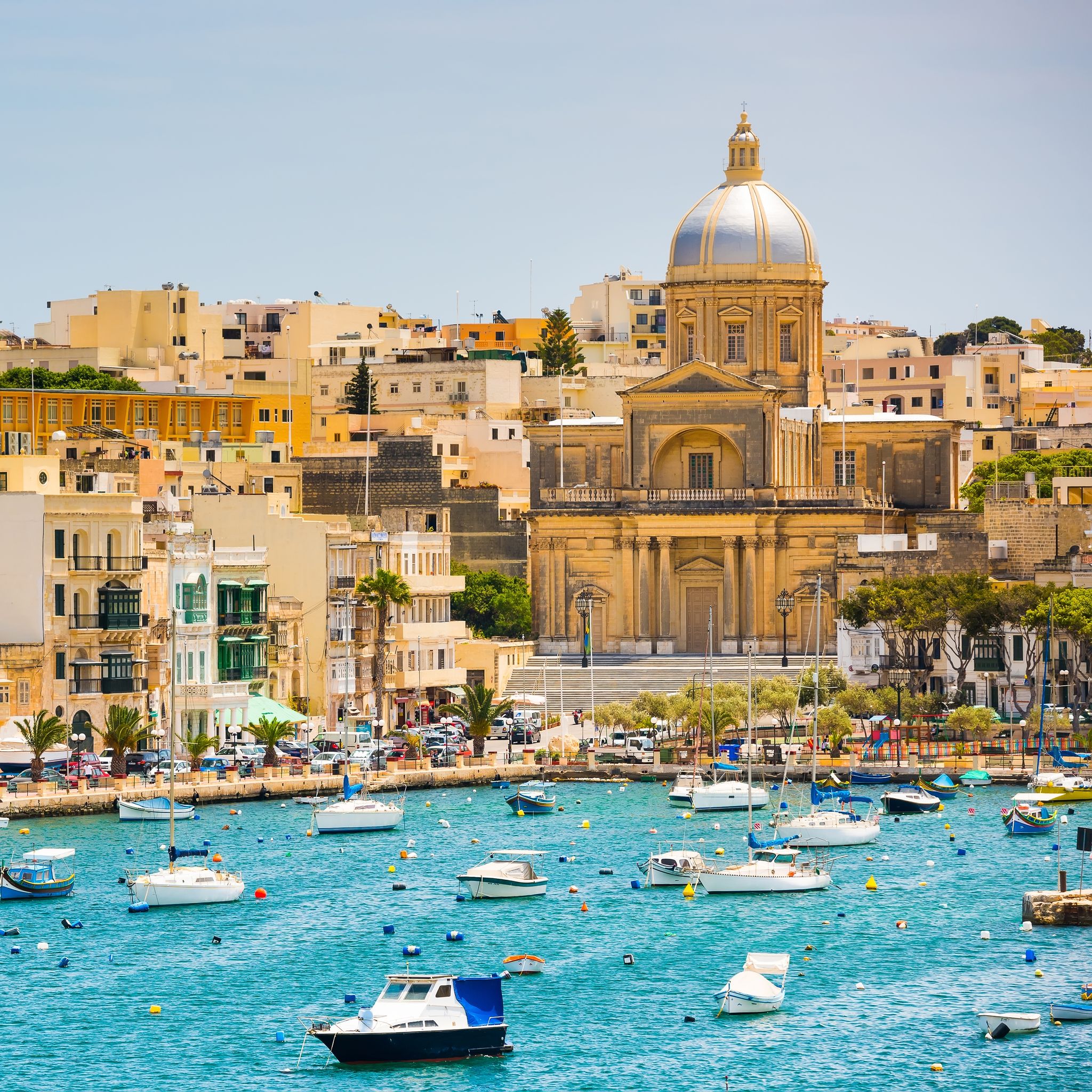 many little yachts and boats from plan wiev to the bay near Valletta in Malta.