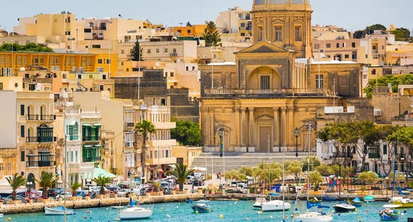 many little yachts and boats from plan wiev to the bay near Valletta in Malta.