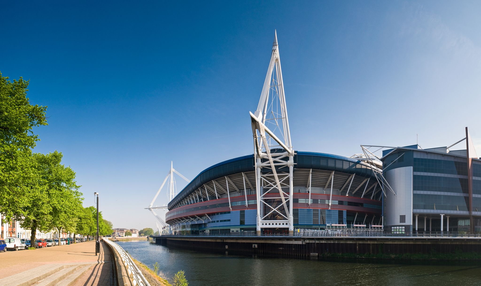 Summer sun over the River Taff and Millennium sports stadium in Cardiff.