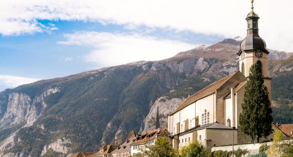 Cathedral of Saint Mary of the Assumption with surrounding alpine mountains, Chur, Switzerland