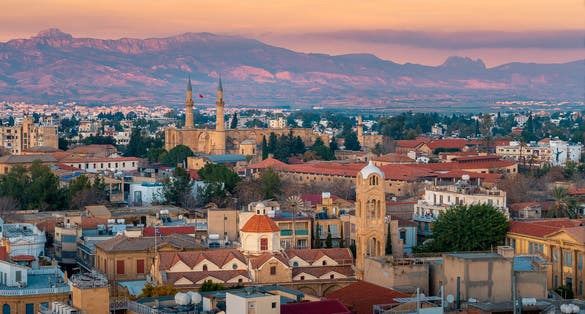 photo of view of Beautiful aerial view over old town of Nicosia, Northern Cyprus and Selimiye Mosque in Cyprus.