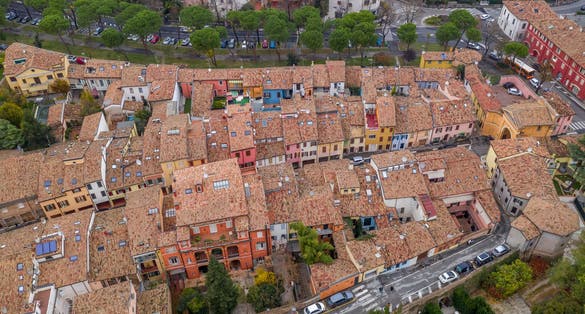 Photo of aerial view of colorful medieval Italian houses with red roofs in Cesena, Cesena Forli provice, Emilia Romagna Italy.