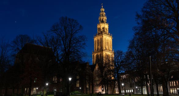 photo of the Martinitoren from the Martinikerkhof at night in Groningen, The Netherlands.