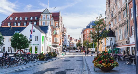 Colorful scene at the Aalborg old town center near Jens Bangs Stonehouse