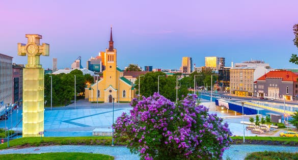 Photo of view of Freedom Square at twilight in Tallinn, Estonia.