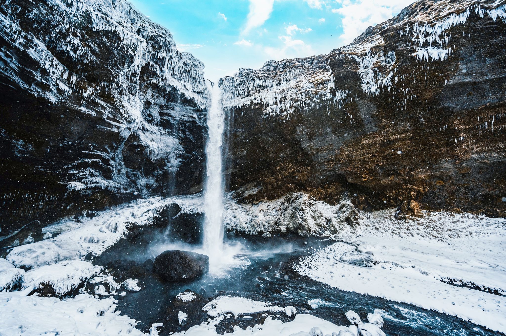 photo of Kvernufoss waterfall, Iceland. Icelandic winter landscape.